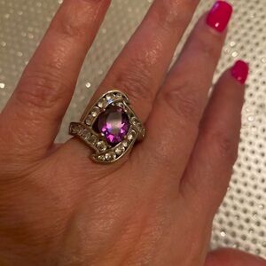 Elegant Purple Gemstone Silver Ring showing signs of wear in back